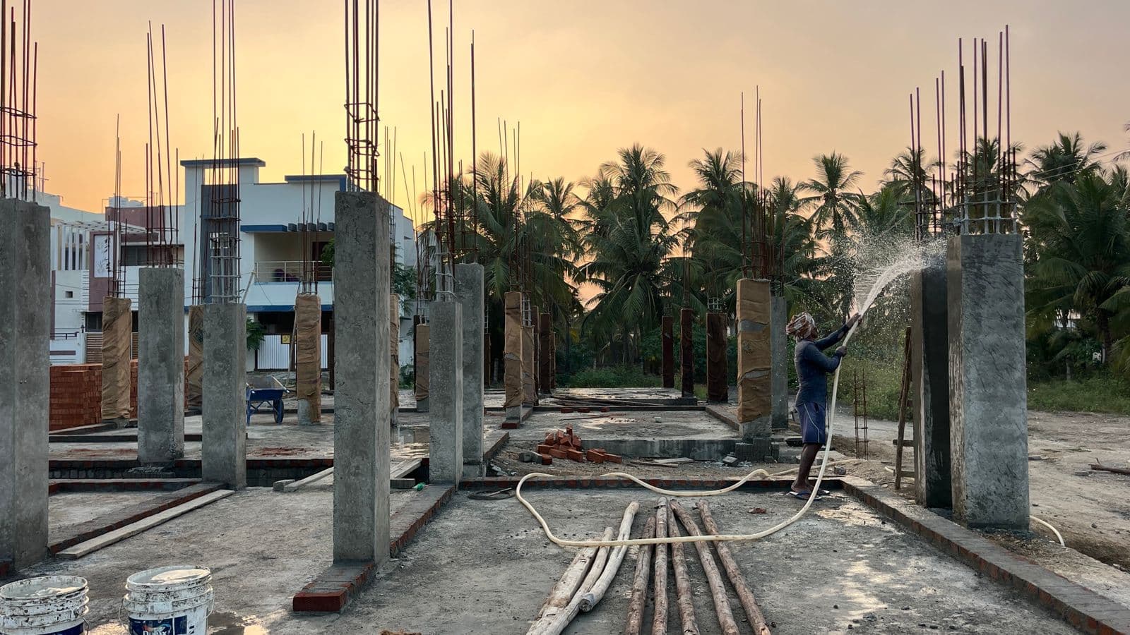 Trivara Townhouses — exterior superstructure under scaffolding.